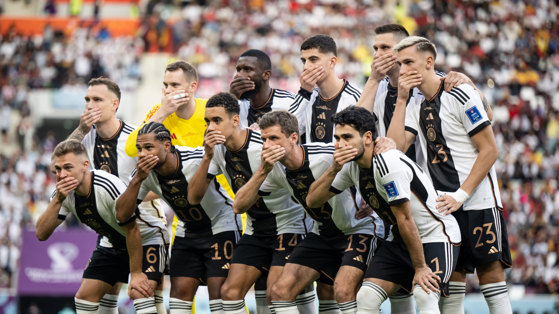 DOHA, QATAR - NOVEMBER 23: Team of Germany protests against FIFA during their team picture prior the FIFA World Cup Qatar 2022 Group E match between Germany and Japan at Khalifa International Stadium on November 23, 2022 in Doha, Qatar. (Photo by Marvin Ibo Guengoer - GES Sportfoto/Getty Images)