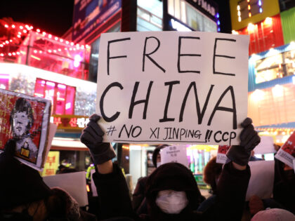 SEOUL, SOUTH KOREA - NOVEMBER 30: Protesters participate in a vigil commemorating victims