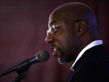 CAMILLA, GEORGIA - NOVEMBER 30: Georgia Democratic Senate candidate U.S. Sen. Raphael Warnock (D-GA) speaks during a campaign rally on November 30, 2022 in Camilla, Georgia. Sen. Warnock continued to campaign throughout Georgia for the runoff election on December 6 against his Republican challenger Herschel Walker. (Photo by Alex Wong/Getty …