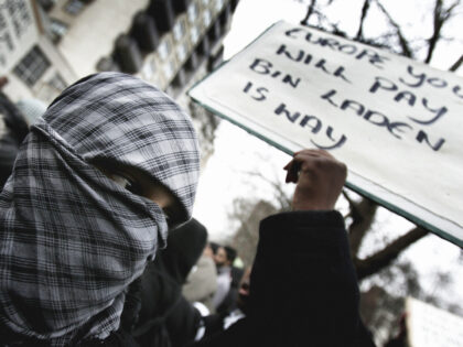 LONDON - FEBRUARY 03: Muslims protest outside the Danish Embassy on FEBRUARY 3, 2006 in Lo