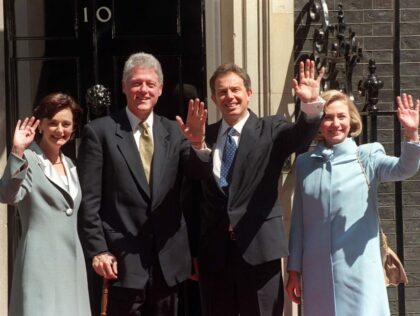 US President Bill Clinton and wife Hillary (right) pose with Prime Minister Tony Blair and wife Cherie on their arrival in Downing Street today (Thursday). The President is on a one-day visit to the UK, before flying back to the US tonight. (Photo by Stefan Rousseau - PA Images/PA Images …