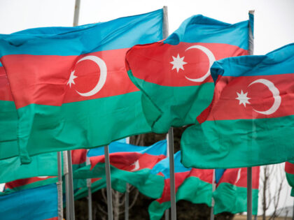 Azerbaijan national flags fly in Baku, Azerbaijan, on Sunday, March 18, 2018. Two years after descending into junk, Azerbaijan's shortest path to winning back its investment grade is by rebuilding the stash of petrodollars it raided during a recession and a banking meltdown, according to Fitch Ratings. Photograph: Taylor Weidman/Bloomberg …