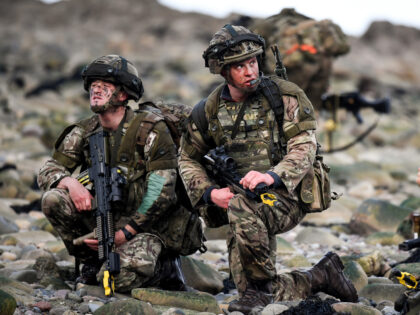 DUNDRENNAN, SCOTLAND - APRIL 26: Royal Marines come ashore as they take part in Exercise Joint Warrior on April 26, 2018 in Dundrennan,Scotland. The exercise is involving some 11,600 military personnel from seventeen nations, in one of the largest exercises of its kind in Europe, operating out of Her Majesty's …