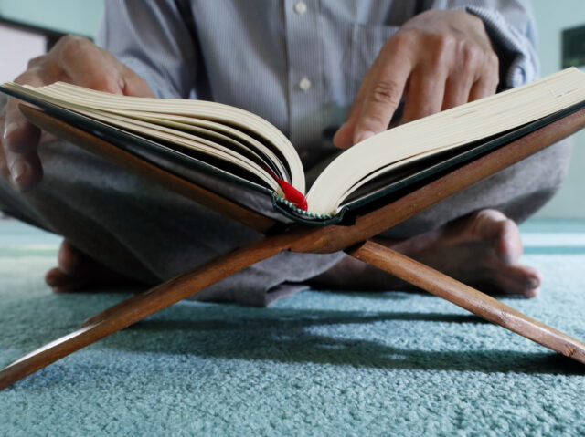 Masjid Al Rahim Mosque. Imam reading the holy Quran. Ho Chi Minh City. Vietnam.