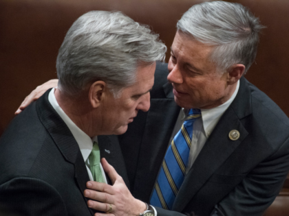 UNITED STATES - JANUARY 30: House Majority Leader Kevin McCarthy, R-Calif., left, and Rep. Fred Upton, R-Mich., appear during President Donald Trump's State of the Union address to a joint session of Congress in the House chamber on January 30, 2018. (Photo By Tom Williams/CQ Roll Call)