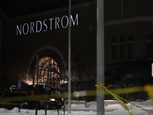 Caution tape and police cars are seen outside Nordstrom at Mall of America after a shootin