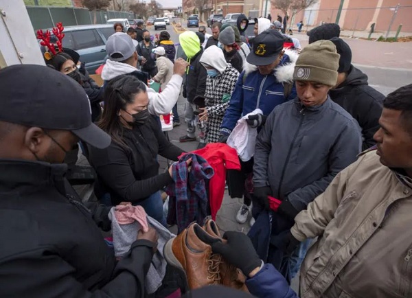 El Paso residents donated clothing for migrants forced to camp out on city streets. (AP Photo/Andres Leighton)