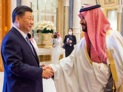 In this photo made available by Saudi Press Agency, SPA, Saudi Crown Prince and Prime Minister Mohammed bin Salman, right, greets Chinese President Xi Jinping, during the Gulf Cooperation Council (GCC) Summit, in Riyadh, Saudi Arabia, Friday, Dec. 9, 2022. Gulf Arab leaders and others in the Mideast met Friday …