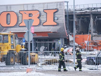 2022/12/09: Firefighters seen after extinguishing the OBI hypermarket. The fire occurred at OBI in the Mega Khimki shopping center completely destroying the store. (Photo by Alexander Sayganov/SOPA Images/LightRocket via Getty Images)