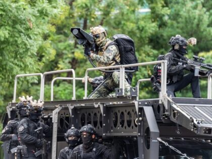 SEOUL, SOUTH KOREA – August 24, 2022: A South Korean soldier uses an anti-drone gun duri