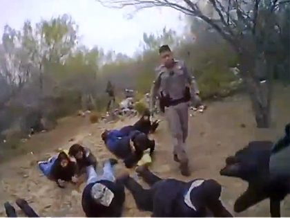 Texas DPS troopers apprehend migrants in the brush. (Texas Department of Public Safety)