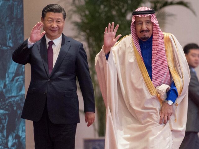 BEIJING, CHINA - MARCH 16: (----EDITORIAL USE ONLY MANDATORY CREDIT - "BANDAR ALGALOUD / SAUDI KINGDOM COUNCIL / HANDOUT" - NO MARKETING NO ADVERTISING CAMPAIGNS - DISTRIBUTED AS A SERVICE TO CLIENTS----) Saudi Arabia's King Salman bin Abdulaziz Al Saud (L) and Chinese President Xi Jinping (R) are seen as …