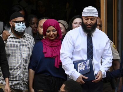 Adnan Syed, center right, leaves the courthouse after a hearing on Sept. 19, 2022, in Baltimore. Hae Min Lee's brother, Young Lee, has asked the Maryland Court of Special Appeals to halt court proceedings for Syed, whose conviction in Lee's 1999 killing was reversed by Baltimore Circuit Judge Melissa Phinn …