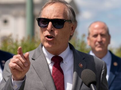 Rep. Andy Biggs, R-Ariz., center, speaks, at a news conference with Rep. Ralph Norman, R-S.C., back left, and Rep. Dan Bishop, R-N.C., Wednesday, May 12, 2021, as they express their opposition to "critical race theory," on Capitol Hill in Washington. (AP Photo/Jacquelyn Martin)