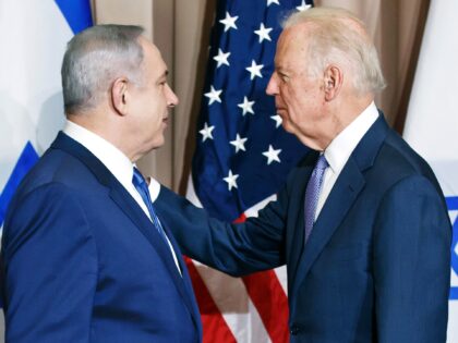 Israeli Prime Minister Benjamin Netanyahu, left, and US Vice-President Joe Biden speak in
