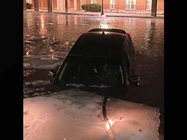 Indianapolis Woman Drives Vehicle on Frozen Canal, Crashes Through Ice - Vimarsana News