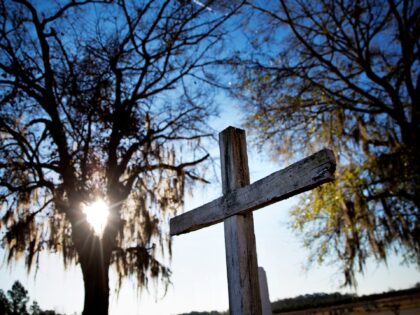 In this Wednesday, Feb. 1, 2017 photo, a cross stands outside a church in Estill, S.C. Est
