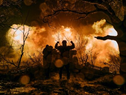 Ukrainian soldiers fire an artillery at Russian positions near Bakhmut, Donetsk region, Uk