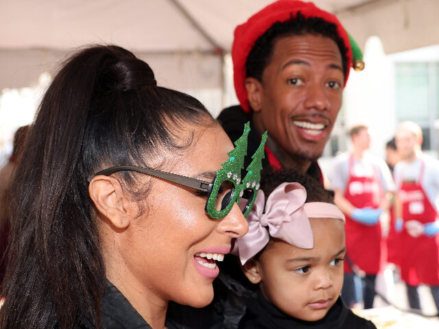 LOS ANGELES, CALIFORNIA - DECEMBER 23: Brittany Bell, Nick Cannon and daughter Powerful Qu