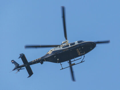 Patroling New York City Police Department Helicopter as seen flying over Central Park in M