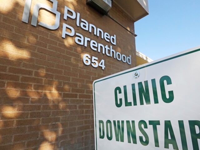 FILE - In this Aug. 21, 2019, file photo, a sign is displayed at Planned Parenthood of Uta