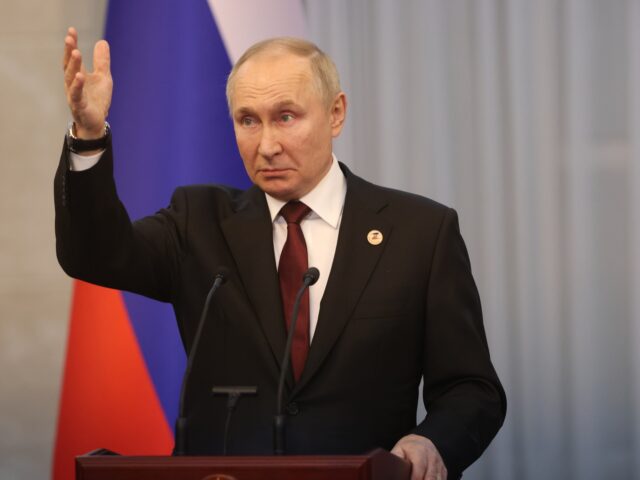BISHKEK, KYRGYZSTAN - DECEMBER 9: (RUSSIA OUT) Russian President Vladimir Putin gestures d