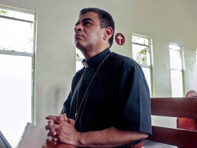Nicaraguan Catholic bishop Rolando Alvarez prays at the Santo Cristo de Esquipulas church