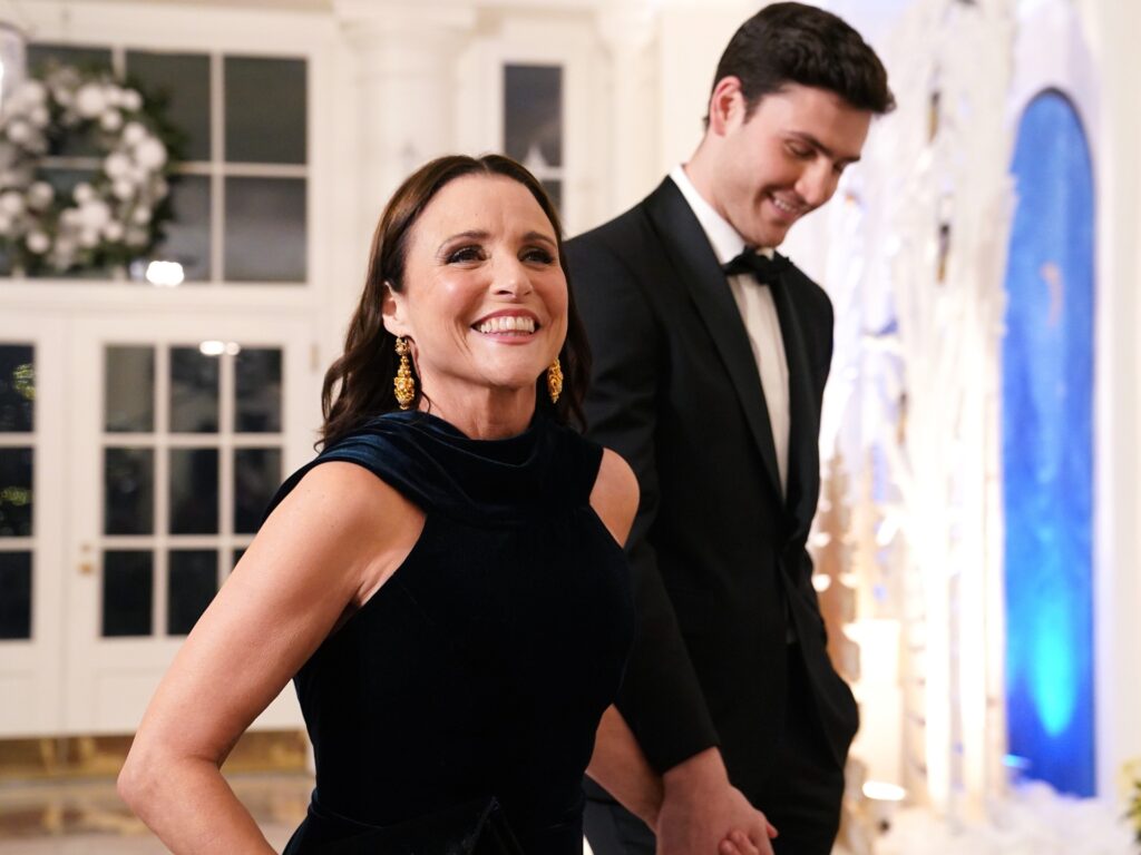 WASHINGTON, DC - DECEMBER 01: Actress Julia Louis-Dreyfus and her son Charlie Hall arrive for the White House state dinner for French President Emmanuel Macron at the White House on December 1, 2022 in Washington, DC. The official state visit is the first of the Biden administration. (Photo by Nathan Howard/Getty Images)