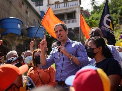 Venezuela opposition leader Juan Guaidó speaks to residents to present his unity plan to Venezuelans in Maiquetia, Venezuela, Feb. 19, 2022. A group of opponents of Venezuelan President Nicolas Maduro is looking to strip Guaidó of his authority as the internationally recognized head of the country's so-called interim government. Three …