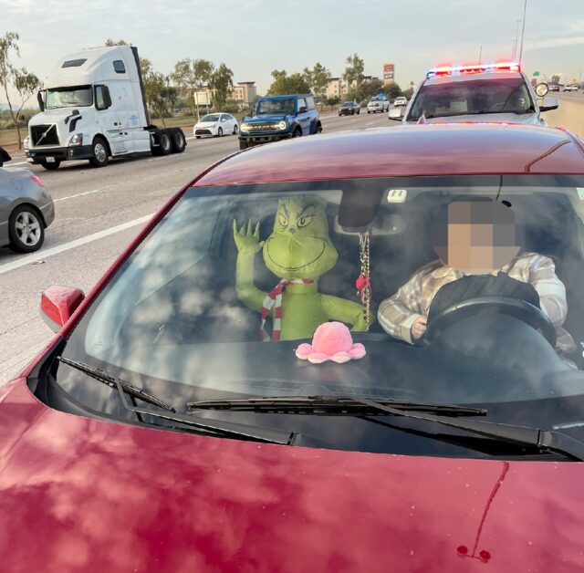 Arizona police fined a driver for using a restricted carpool lane with an inflatable Grinc