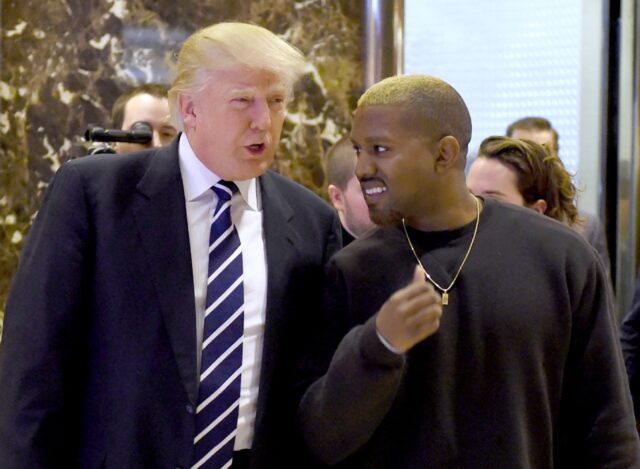 In this file photo taken on December 13, 2016, singer Kanye West and President-elect Donal