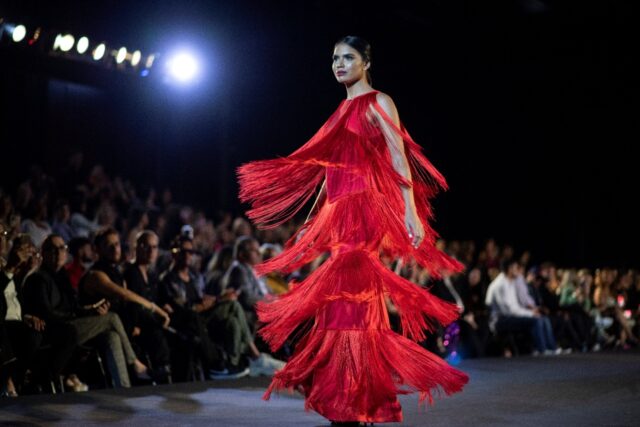 A model presents a creation by Venezuelan designer Giovanni Scutaro as the crisis-wracked