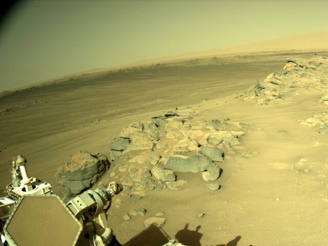 NASA's Perseverance rover looks out on the surface of Mars, where dust devils sweep across