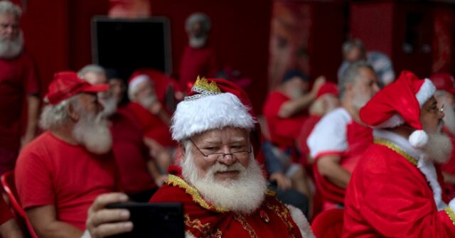 Lean times: Rio Santas line up for nourishing gifts. For themselves ...