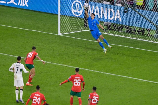 Yassine Bounou tips over from Joao Felix to preserve Morocco's 1-0 win over Portugal in th