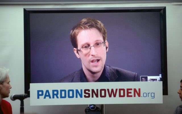 Edward Snowden receives Russian passport
