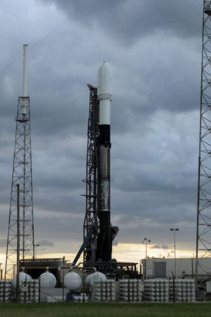 SpaceX launches rocket carry internet satellites for rival company