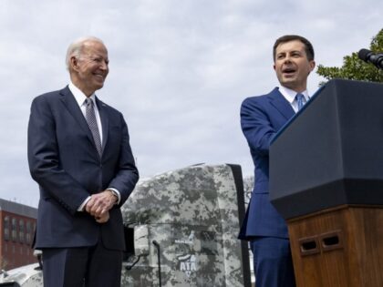 President Joe Biden looks on as Secretary of Transportation Pete Buttigieg delivers remarks at a Trucking Action Plan event Monday, April 4, 2022, on the South Grounds of the White House. (Official White House Photo by Erin Scott)