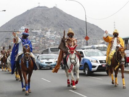Police officers wearing a protective mask to help curb the spread of the coronavirus, from left, to right, Javier Becerra, Jorge Luis Brenis, and Pablo Rojas dressed as the Three Wise Men or Three Kings parade in Lima, Wednesday, Jan. 6, 2021. On the Epiphany, the Catholic Church marks the …