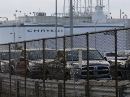 New vehicles are shown parked in storage lots near the the Stellantis Detroit Assembly Complex in Detroit, Wednesday, Oct. 5, 2022. Over the past few years, thieves have driven new vehicles from automaker storage lots and dealerships across the Detroit area. In 2018, eight vehicles were driven from what then …