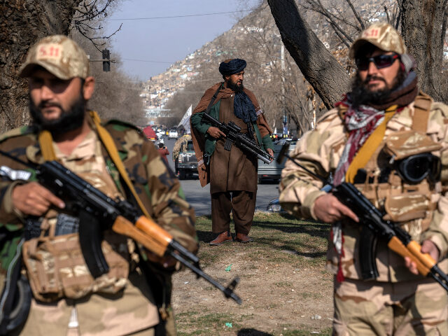 Taliban fighters stand guard in Kabul, Afghanistan, Monday, Dec. 26, 2022. Recent Taliban rulings on Afghan women include bans on university education and working for NGOs, sparking protests in major cities. Security in the capital Kabul has intensified in recent days, with more checkpoints, armed vehicles, and Taliban special forces …