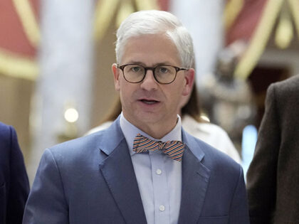 Rep. Patrick McHenry, R-N.C., walks as the House meets for the third day to elect a speake