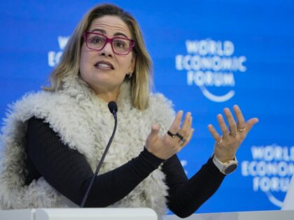 CORRECTS POLITICAL PARTY AFFILIATION TO INDEPENDENT - Sen. Kyrsten Sinema, I-Ariz, speaks on a panel at the World Economic Forum in Davos, Switzerland Tuesday, Jan. 17, 2023. The annual meeting of the World Economic Forum is taking place in Davos from Jan. 16 until Jan. 20, 2023. (AP Photo/Markus Schreiber)