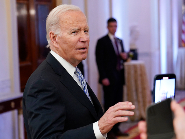 FILE - President Joe Biden talks with reporters after speaking in the East Room of the White House in Washington, Jan 20, 2023. Senior Democratic lawmakers turned sharply more critical Sunday of President Joe Biden's handling of classified materials after the FBI discovered additional items with classified markings at Biden's home. (AP Photo/Susan Walsh, File)