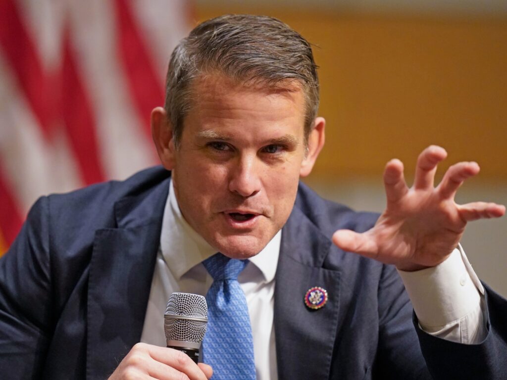 FILE - Rep. Adam Kinzinger, R-Ill., speaks during a U.S. Senate campaign event for independent Evan McMullin Oct. 20, 2022, in Salt Lake City. Democrats running for office this year in Republican-leaning areas or swing states are grappling with how much they should talk about the Jan. 6 insurrection, if at all. McMullin, a former Republican running against Utah Sen. Mike Lee, has made talking about the Jan. 6 riot a central part of his campaign. (AP Photo/Rick Bowmer, File)