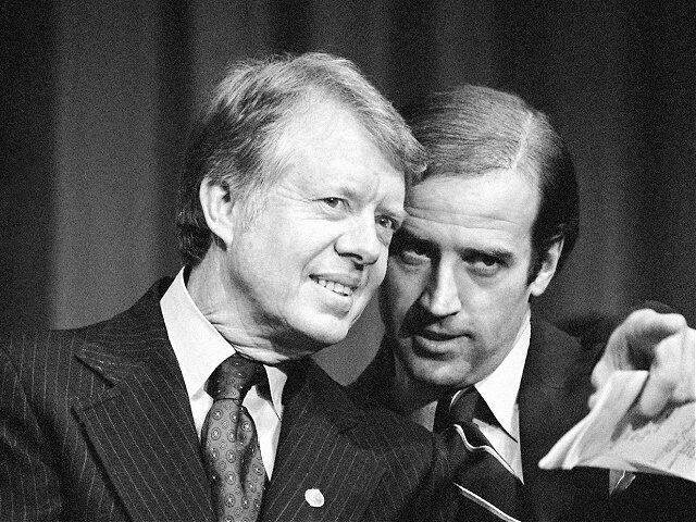 FILE - In this Feb. 20, 1978, file photo, President Jimmy Carter listens to Sen. Joseph R.