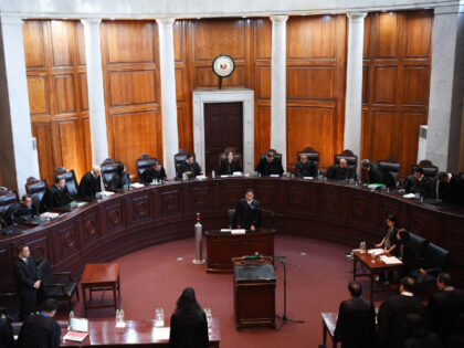 Members of the Supreme Court of the Philippines, led by its newly-appointed Chief Justice Teresita de Castro (back C), hear oral arguments on the petition to quit the International Criminal Court, at the Supreme Court in Manila on August 28, 2018. - The Philippines' top court heard arguments on August …