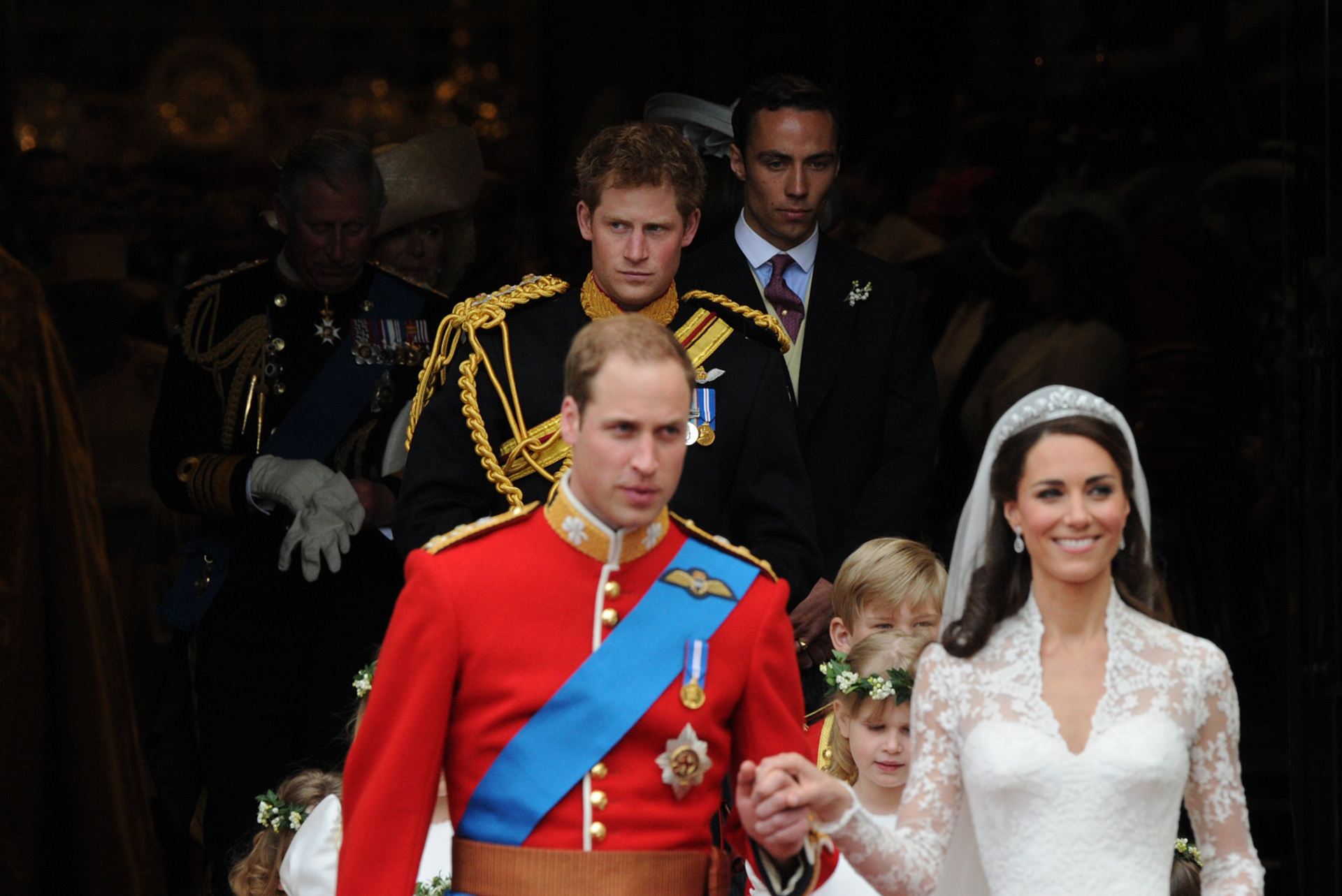 Britain's Prince Harry (background C) leaves Westminster Abbey in London, following the wedding ceremony of his brother Prince William (Front L) and Kate, (Front R) Duchess of Cambridge, April 29, 2011. AFP PHOTO / CARL DE SOUZA ( Image credit should read CARL DE SOUZA/AFP via Getty Images)
