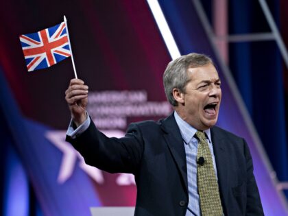 Nigel Farage, leader of the Brexit Party, holds a British Union flag, also known as a Union Jack, while speaking during the Conservative Political Action Conference (CPAC) in National Harbor, Maryland, U.S., on Friday, Feb. 28, 2020. President Trump will address this years CPAC after seeking to close ranks within …