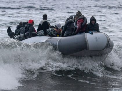 A dinghy transporting 27 refugees and migrants originating from Gambia and the Republic of Congo is pulled towards Lesbos island after being rescued by a war ship during their sea crossing between Turkey and Greece on February 29, 2020. - Greece blocked hundreds of migrants trying to enter the country …